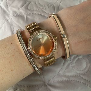 Rose gold watch with two bracelets